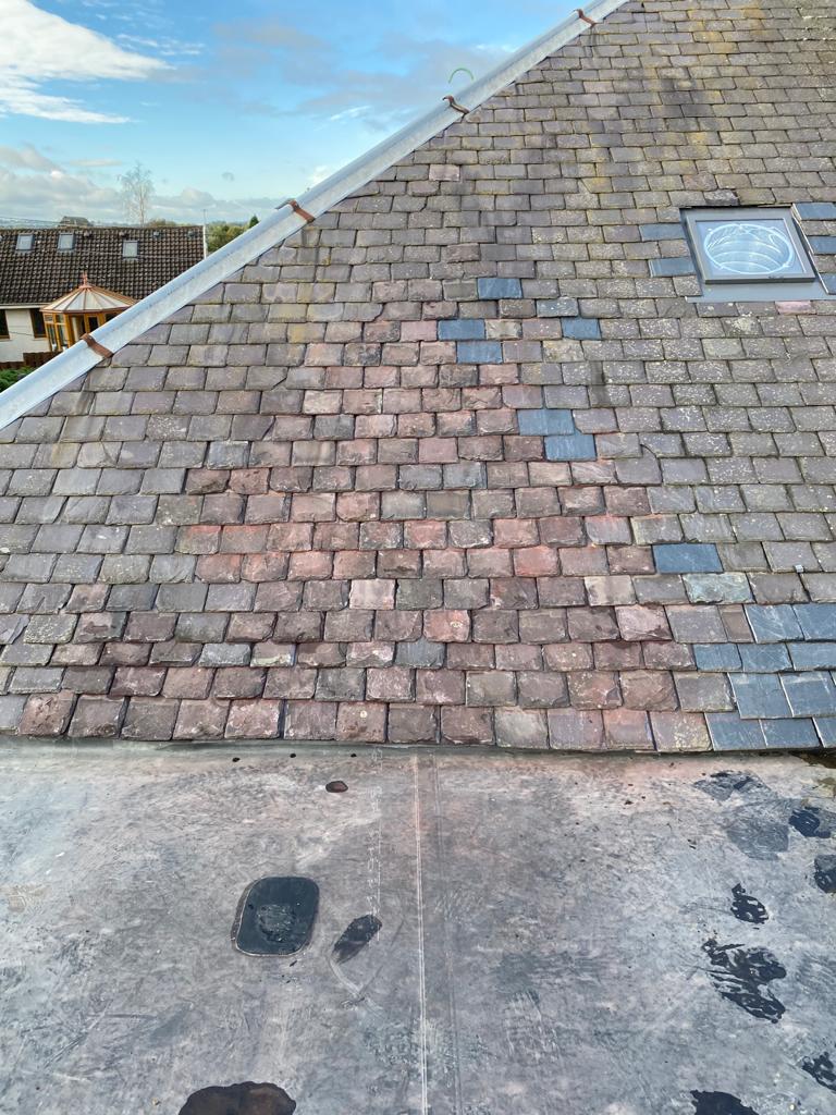 Tiled Roof Edinburgh with new sun light section by Munro Roofing Services