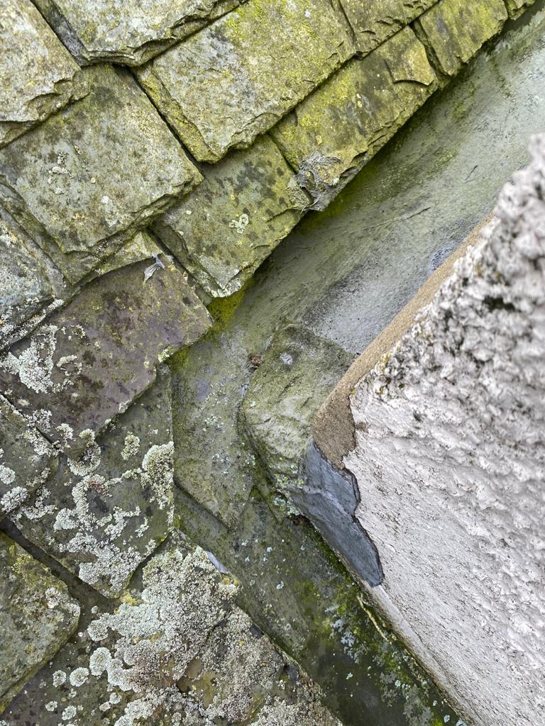 Rhone guttering on a traditional slate roof
