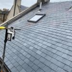 A new Slate Roof with a velux window installed by Munro Roofing Edinburgh